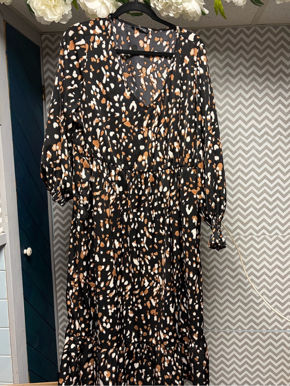 Elegant BloomChic Black Midi Dress with Brown and Cream Spot Print
